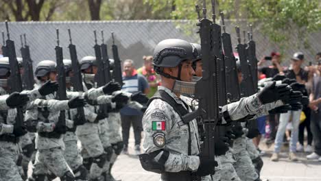 Heavy-armed-mexican-soldiers-are-marching-during-parade-of-Mexican-Independence-Day