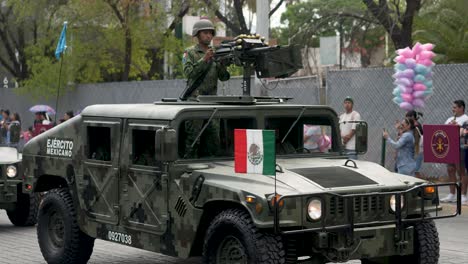 Mexican-military-driving-humwee-equiped-with-granade-launcher