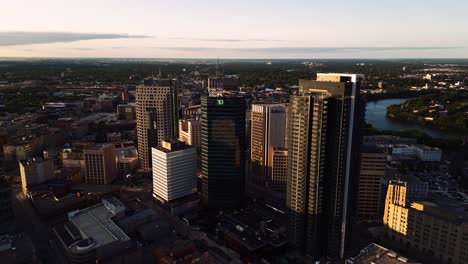 A-Timelapse-Skyscraper-Sunset-Golden-Hour-Aerial-View-of-the-Urban-Park-Canadian-Museum-for-Human-Rights-The-Forks-Market-Downtown-Winnipeg-Shaw-Park-Provencher-Bridge-Red-River-in-Manitoba-Canada