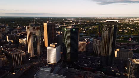 A-Skyscraper-Capital-Sunset-Golden-Hour-Aerial-View-of-the-Urban-Park-Canadian-Museum-for-Human-Rights-The-Forks-Market-Downtown-Winnipeg-Shaw-Park-Provencher-Bridge-Red-River-in-Manitoba-Canada