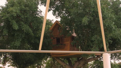 Wooden-tree-house-for-kids-Built-by-their-father-in-the-garden-of-the-house,-the-tree-house-was-created-by-a-professional-carpenter-with-attention-to-the-smallest-details-and-a-high-level-of-safety