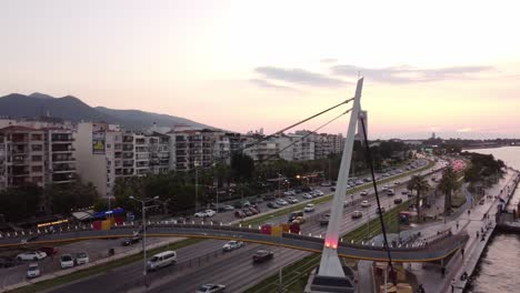Drone-footage-of-Izmir-Bridge-with-Aerial-View-at-sunset-while-traffic-is-flowing