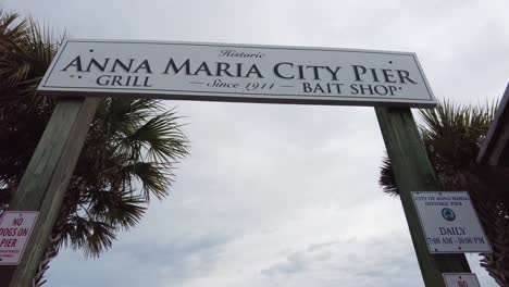Walking-down-Anna-Maria-Island-City-Pier-in-Anna-Maria-Island,-Florida