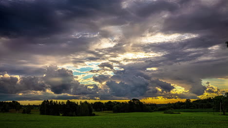 Clouds-Drift-Across-a-Heavenly-Sky-with-Warm-Glow-of-Sunlight-Peering-Through-the-Cloudy-Skies-in-a-Timelapse