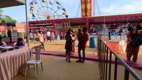 A-family-is-taking-their-two-children-and-turning-them-into-a-fair