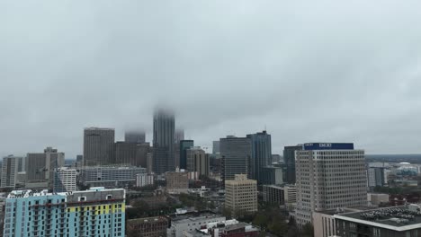 Iconic-skyscrapers-covered-in-clouds,-Timelaspe