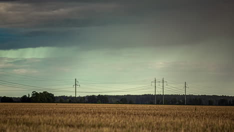 Rainstorm-over-a-farmland-field-of-wheat---storm-chaser-time-lapse