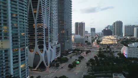 Aerial-Drone-Fly-Around-Miami-Downtown-Business-Center-Florida,-Highway-Traffic-and-Skyscrapers-of-Modern-City,-USA