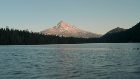 Low-aerial-shot-over-Lost-lake-as-the-sunset-light-hits-Mount-Hood