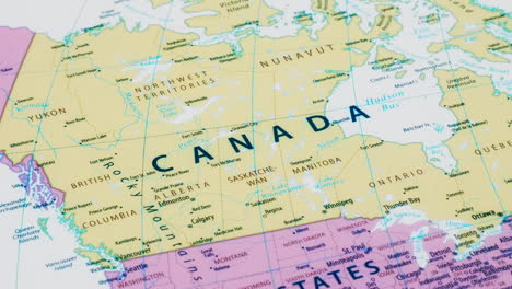 Close-up-of-the-country-word-Canada-on-a-world-map-with-the-detailed-name-of-the-capital-city
