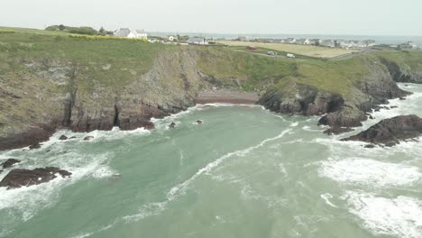 Scenic-Cliffs-And-Seascape-In-Ballycotton,-County-Cork,-Ireland---aerial-drone-shot