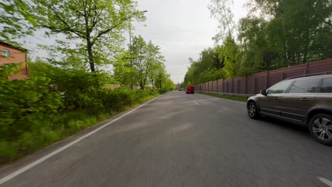 Point-of-view-footage-of-a-car-driving-at-high-speed-through-a-residential-area-in-Helsinki