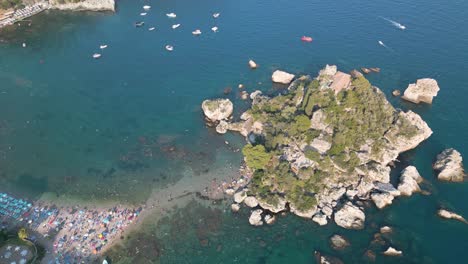 Spectacular-Drone-Shot-Above-Isola-Bella-in-Sicily,-Italy