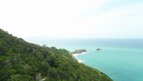 A-phenomenal-view-above-the-rainforest-on-a-mountain-located-along-the-ocean-in-Koh-Lanta,-Thailand