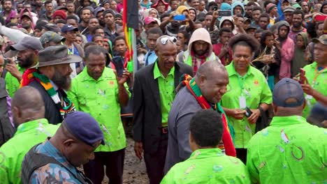 Papua-New-Guinea-Prime-Minister-walks-through-crowd-greeting-and-shaking-hands