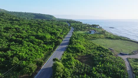 Drone-flying-over-panoramic-road-along-coast,-Barahona-in-Dominican-Republic