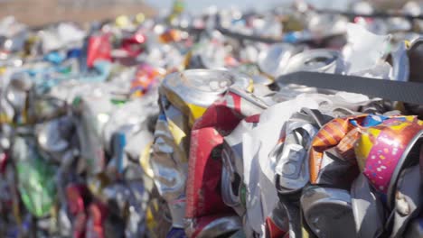 Close-up-of-a-bale-of-aluminum-cans-compacted-for-further-recycling