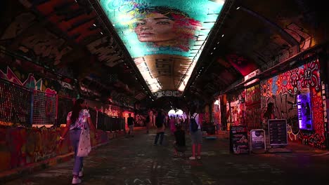Walking-under-Waterloo-in-The-Graffiti-Tunnel-and-looking-it's-style,-London,-United-Kingtom