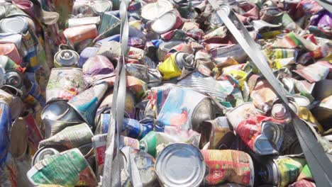 Close-up,-top-view-of-bales-of-aluminum-cans-compacted,-ready-for-recycling