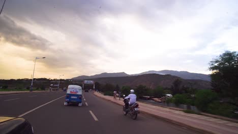 Driving-Behind-Tuk-tuk-On-The-Road-In-Omo-Valley,-Ethiopia