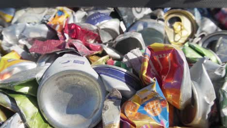 Close-up,-dollyout-of-a-bale-of-compacted-aluminum-cans-ready-for-recycling