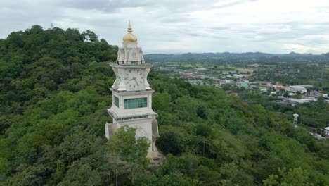 Clock-Tower-Nestled-on-a-Hill-Amongst-Forest-Trees-in-Thailand