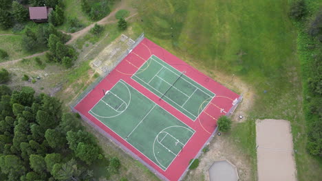 Tennis-and-Basketball-Courts-in-the-Outdoors-of-a-Summer-Camp-in-the-Woods