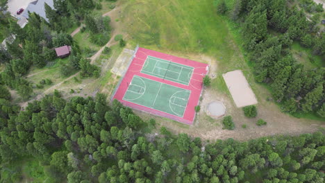 Outdoor-Basketball-Courts-and-Tennis-Courts-next-to-River-and-Forest