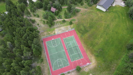 Basketball-and-Tennis-Courts-in-the-Woods---Aerial-View-of-Summer-Camp-Outdoor-Recreation-Space