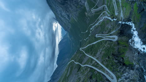 Vertical-timelapse-of-clouds-in-Romsdalen-valley,-Trollstigen-pass-hairpin-bends
