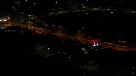 Drone-view-of-vehicle-with-flashing-lights-going-to-emergency-event