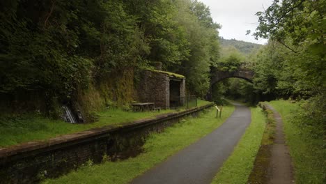 Wide-Shot-of-Cynonville-Station-with-old-railway-bridge-in-background-and-cycle-path