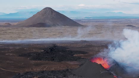 Volcano-cones-in-Iceland-with-active-crater-spewing-magma