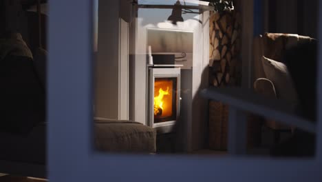 lit-fireplace-through-window-view