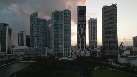 Aerial-Panoramic-Drone-Fly-Around-Skyscrapers-in-Miami-Downtown-at-Dusk-Landmark