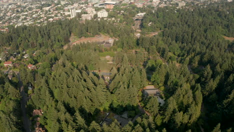 Pan-up-reveal-aerial-shot-of-Portland-Oregon-from-forest-park