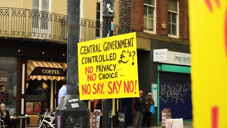 yellow-protest-signs-from-average-UK-citizens-to-use-it-as-their-voice-about-rejecting-the-CBDC-central-government-currency-that-has-no-privacy-and-choice-for-people-economy-is-collapsing-rage-rises
