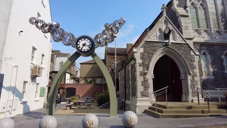 Waterford-City-Centre-viking-Triangle-clock-artwork-on-a-bright-summer-day