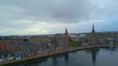 Aerial-4K-Drone-Footage-Approaching-Old-High-Church-by-the-River-in-Inverness,-Scotland