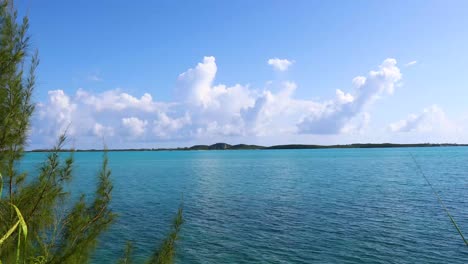 Static-shot-of-the-ocean-and-land-in-the-distance-on-Exuma-in-the-Bahamas