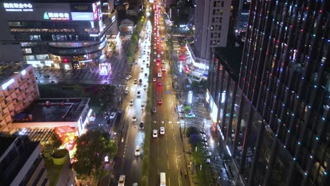 Aerial-Drone-Shot-of-Downtown-Traffic-City-of-Chengdu,-China