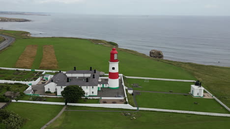 Aerial-drone-shot-of-Souter-Lighthouse-and-sea-coastline-Sunderland-North-East-England