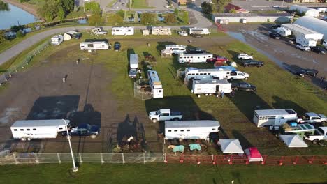 Drone-view-of-horse-trailers-and-campers-in-a-small-town