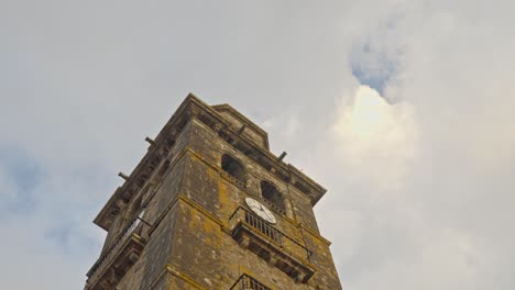 Looking-Up-at-Iglesia-de-la-Concepcion-Historical-Clock-Tower-Church-with-Clouds-in-the-Background-with-Rotating-View