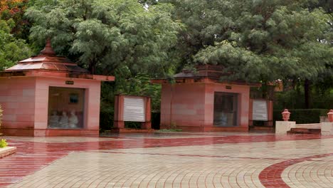 artistic-red-stone-jain-temple-at-morning-from-unique-angle-video-is-taken-at-Shri-Digamber-Jain-Gyanoday-Tirth-Kshetra,-Nareli-Jain-Mandir,-Ajmer,-Rajasthan,-India-an-Aug-19-2023.
