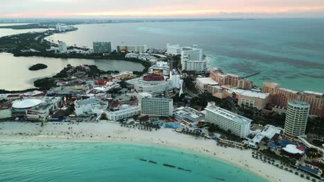 Aerial-view-of-Cancun-resort-hotel-district-in-riviera-Maya-Mexico-with-pristine-ocean-Caribbean-water-and-tropical-white-sand-beach