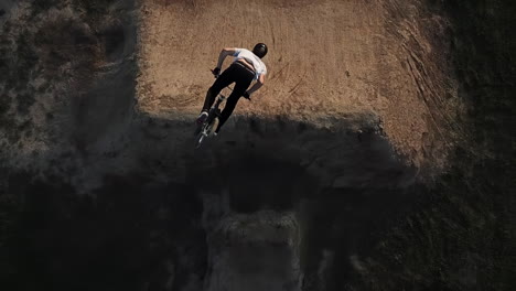 Extreme-Sports-BMX-backflip-on-a-large-dirt-jump-course