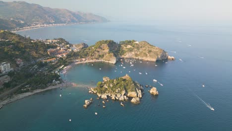 Beautiful-Drone-Shot-Above-Isola-Bella-near-Taormina,-Sicily