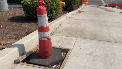 New-sidewalk-with-road-cones-protecting-traffic