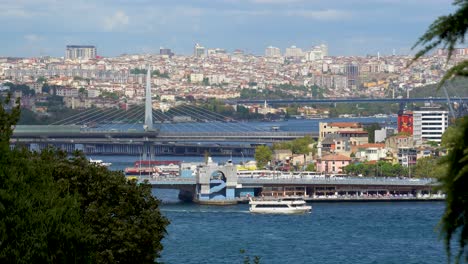 Golden-Horn-Metro-Bridge-In-Istanbul,-Turkey,-Ferry-Traffic,-Cars,-City-Skyline,-Bosphorus